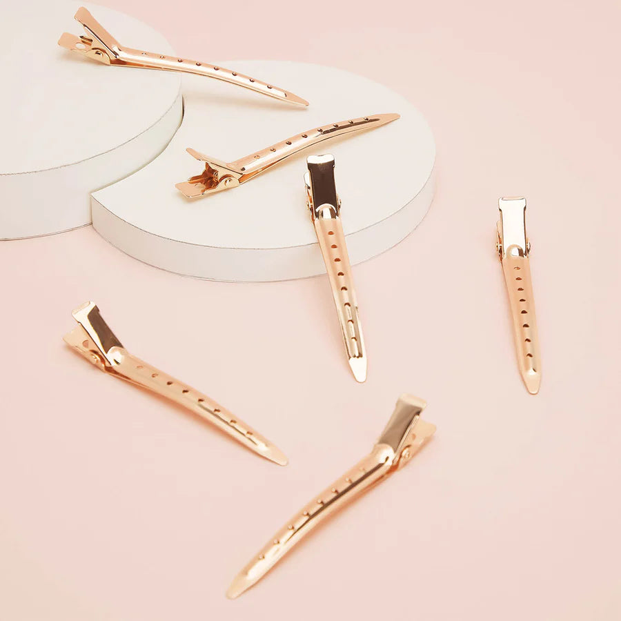 KITSCH Rose Gold Styling Clips – lette, elegante hårklemmer i rosa guld. Sikkert greb til styling, klipning og makeup. 6 stk. i professionel kvalitet.