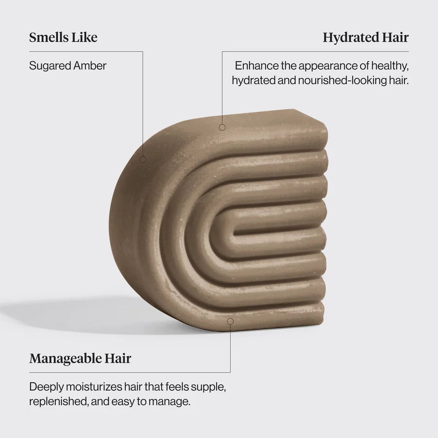 Fugtgivende conditioner bar med shea butter og kokosolie.