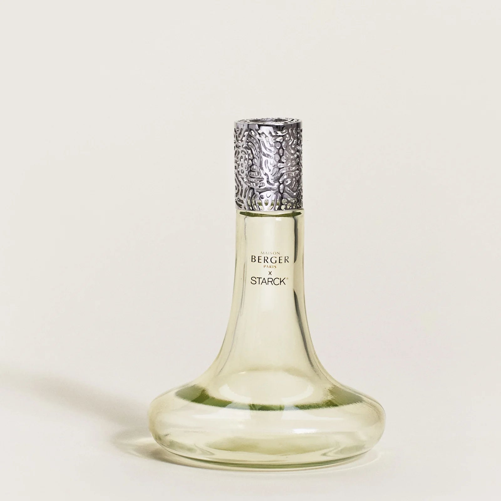 Maison Berger Paris x Philippe Starck Peau d’Ailleurs duftlampe – et ikonisk katalytisk duftlampe-sæt, hvor avantgardistisk design, effektiv luftrensning og en mystisk, mineralsk duft skaber en sanselig rejse ud over det velkendte