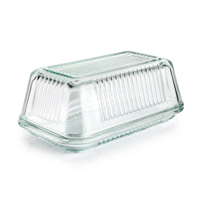 Elegant smørskål i glas med låg til 250 g smør. Bevarer smag og friskhed, tåler opvaskemaskine og passer smukt på både bord og i køleskab.