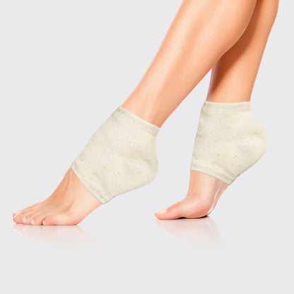 Få bløde, velplejede fødder med KITSCH Moisturizing Spa Socks. Genanvendelige, fugtgivende sokker med gel-lining, der blødgør og plejer tør hud.