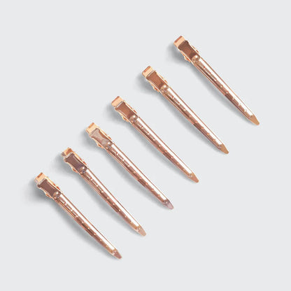 KITSCH Rose Gold Styling Clips – lette, elegante hårklemmer i rosa guld. Sikkert greb til styling, klipning og makeup. 6 stk. i professionel kvalitet.