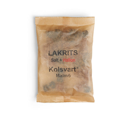 Kolsvart Salt Lakrids &amp; Hindbær – vegansk, glutenfri gourmet slik fra Sverige. En perfekt balance af salt, sødt og friske bær i én unik smag.