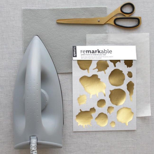 Forvandl pletter og slid til smukke detaljer med ReMarkable strygemærker fra Humade. Kreativ visible mending i mat & blank guld og sølv – reparér tøj med stil.