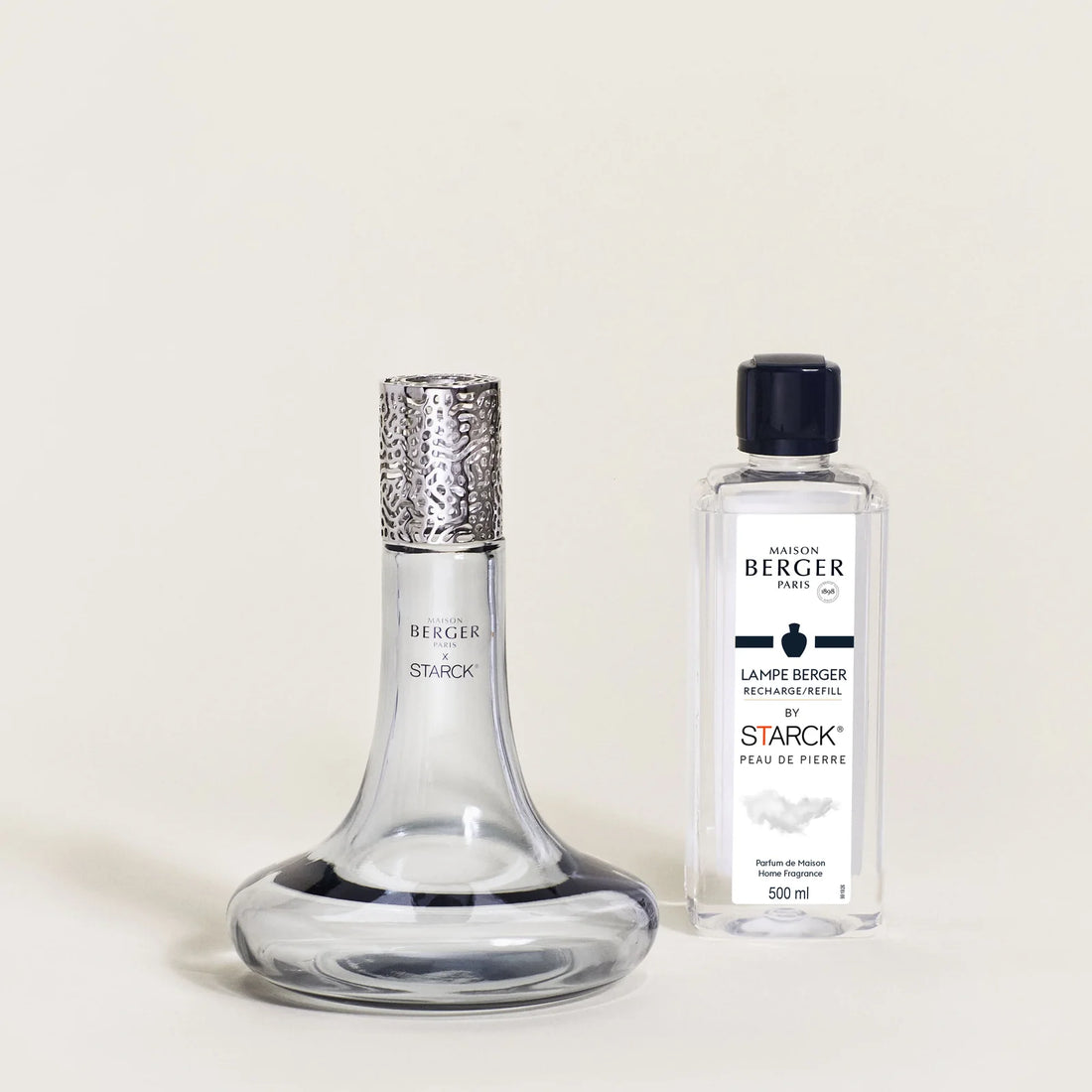 Maison Berger x Philippe Starck Peau de Pierre duftlampe – et ikonisk katalytisk duftlampe sæt, hvor laboratorieinspireret design, effektiv luftrensning og en sensuel, mineralsk duft smelter sammen