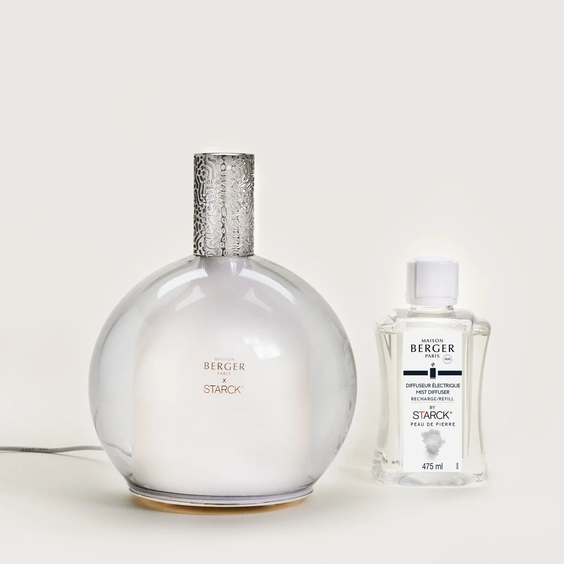 Philippe Starck Diffuser & Peau de Pierre – en sofistikeret og karakterfuld duftoplevelse, der balancerer det maskuline og feminine i et elegant designikon til hjemmet.