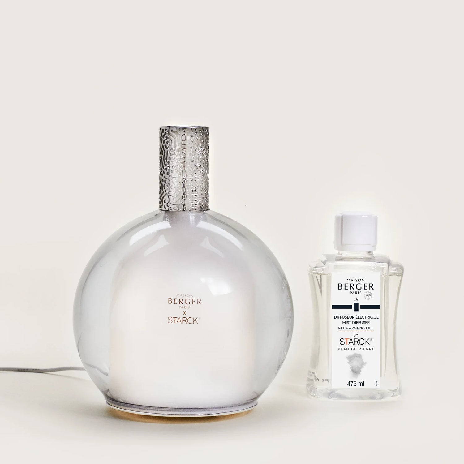 Philippe Starck Diffuser &amp; Peau de Pierre – en sofistikeret og karakterfuld duftoplevelse, der balancerer det maskuline og feminine i et elegant designikon til hjemmet.