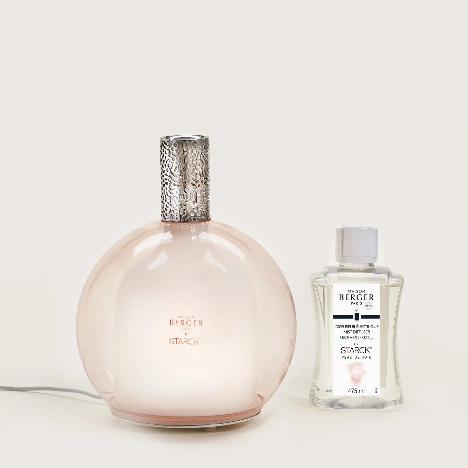 Philippe Starck Diffuser &amp; Peau de Soie – et luksuriøst diffuser-sæt, der indhyller dit hjem i lethed, mystik og sofistikeret ro med et ikonisk design.