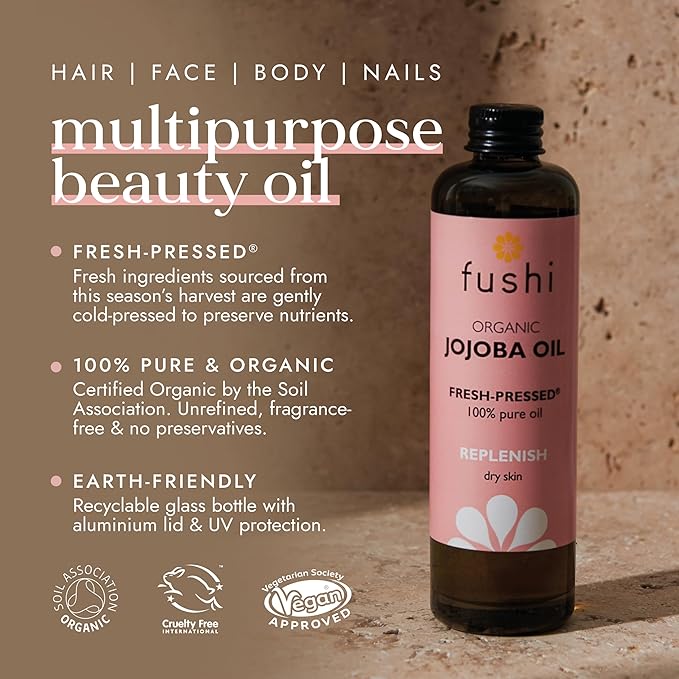 Økologisk jojoba olie fra Fushi i brunt glasflaske med dråbetænger til hud og hårpleje