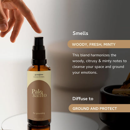 Aromafume Palo Santo roomspray i brunt glasflaske med naturlige krystaller og træpinde til hjemmeduft