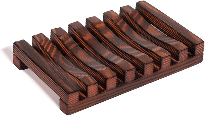 Elegant sæbeskål i mørkt træ, der holder dine shampoo- og balsam bars tørre, forlænger levetiden og giver dit badeværelse et varmt, naturligt udtryk.